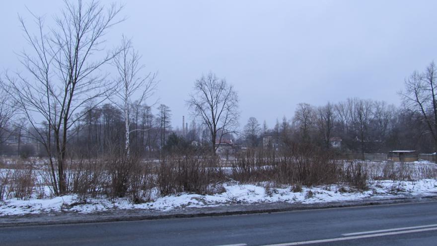 Widok na osadę z drogi wiodącej do Maczek.jpg